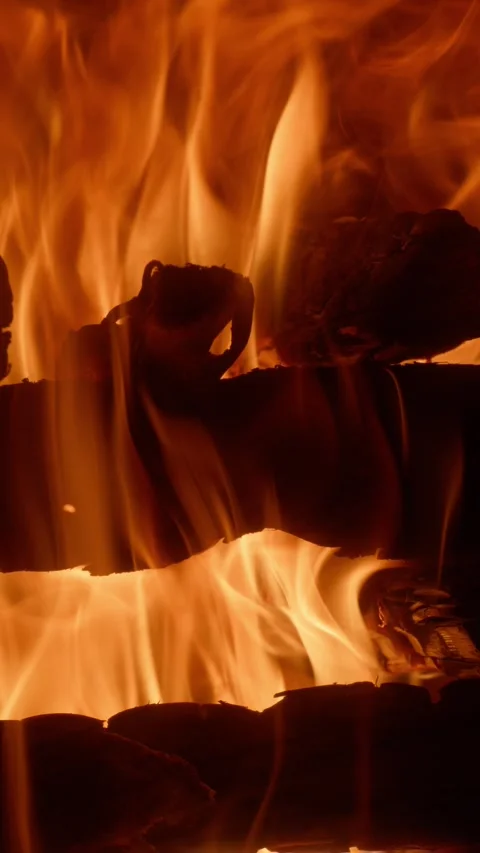 Vertical Slow Motion of Intense Fire Flames and Flying Sparks in Detail 動画素材 328833770