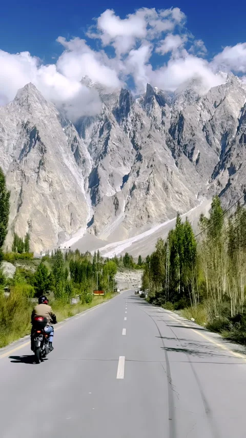 Vertical slow motion POV drive on Karakoram Highway cliffside roads in 4K Stock Footage 305325788