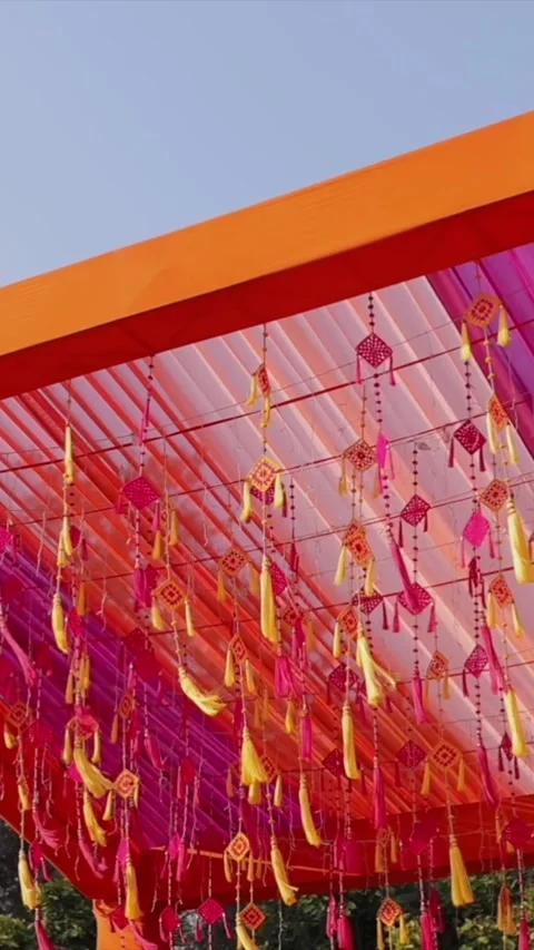 Vertical Slow Motion Shot of Indian Wedding Venue Decoration in India Video stock 335736496