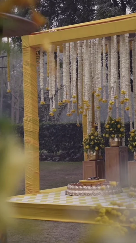 Vertical Slow Motion Shot of Indian Wedding Venue Decoration in India 動画素材 337405422