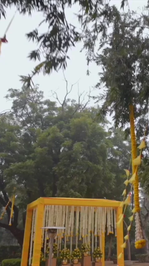 Vertical Slow Motion Shot of Indian Wedding Venue Decoration in India Stock Footage 337405461