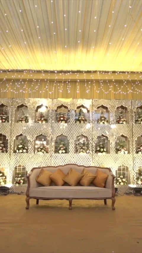 Vertical Slow Motion Shot of Indian Wedding Venue Decoration in India 動画素材 337405538