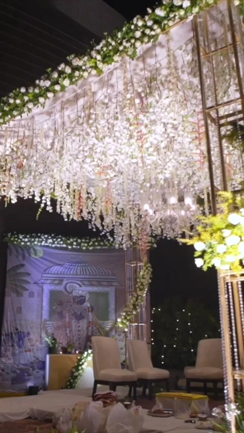 Vertical Slow Motion Shot of Indian Wedding Venue Decoration in India Stock Footage 337405760