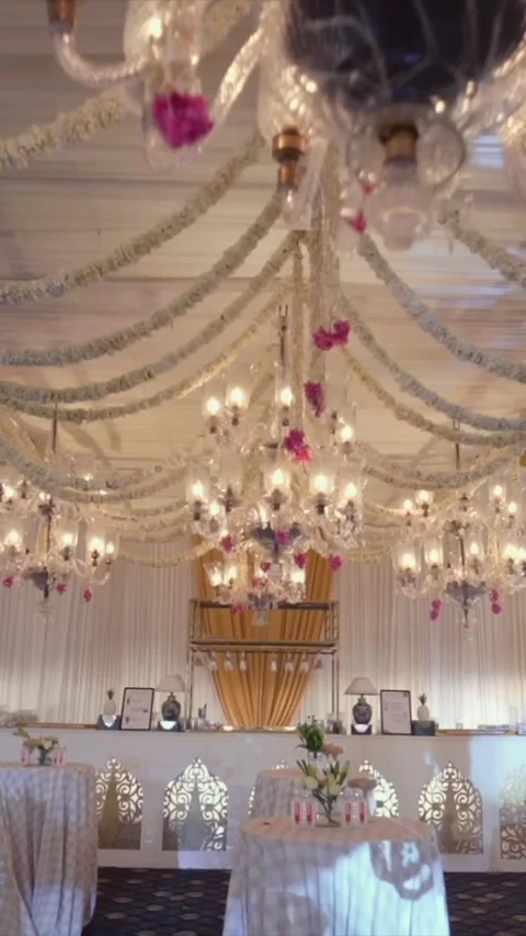 Vertical Slow Motion Shot of Indian Wedding Venue Decoration in India 動画素材 337405779