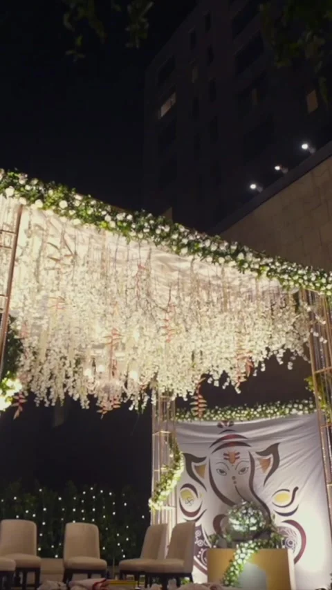 Vertical Slow Motion Shot of Indian Wedding Venue Decoration in India Stock Footage 337405787