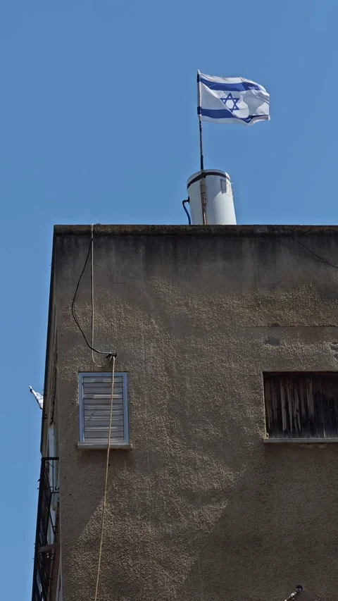 Vertical Slow Motion Shot of Old Residential Building Rooftop with Water Heater Stock Footage 336801751