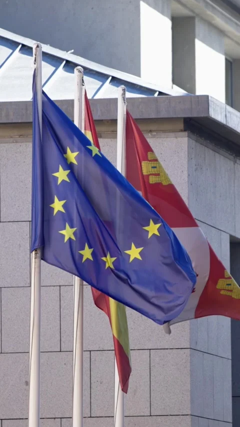 Vertical Slow motion of the Spanish flag waving gracefully in Avila. Stock Footage 307571522