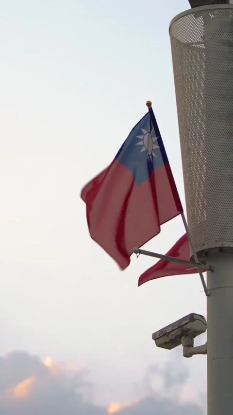 Vertical Slow motion of Taiwan flag waving at sunset Stock Footage 314466317