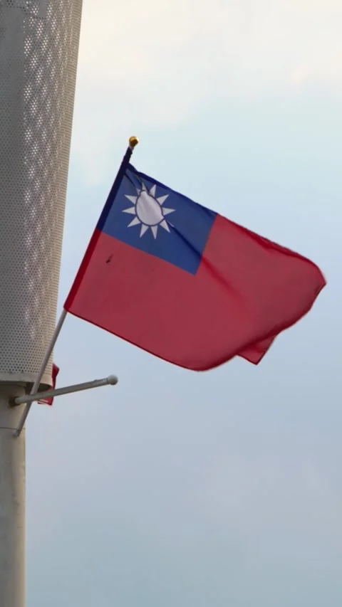 Vertical Slow motion of Taiwan flag against cloudy sky Stock Footage 316700229