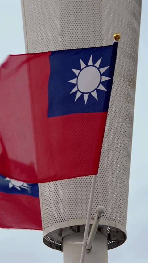 Vertical Slow motion of two Taiwan flags fluttering side by side Stock Footage 318671747