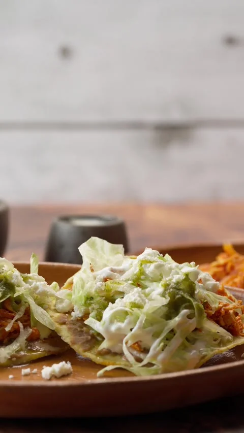 Vertical slow motion video, red tinga toast with chicken, dolly in Stock Footage 282549257