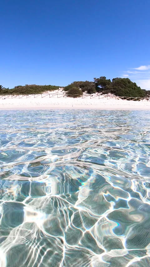 Vertical slow motion view of caustics in Sardinia sea Stock Footage 337116680