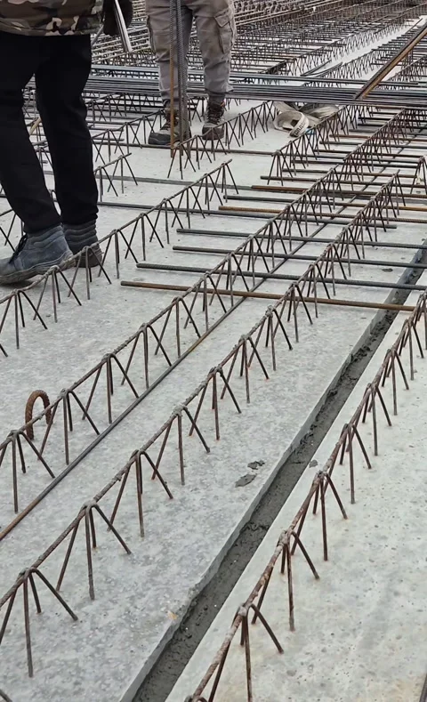 Vertical Slow Motion Workers Placing Rebar in Twin Wall Stock-Footage 336498182