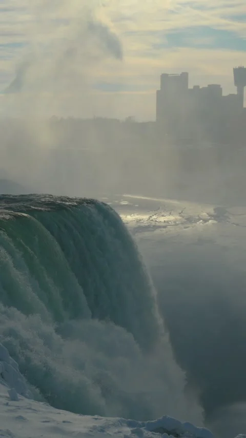 Vertical Slow Zoom In On American Falls In Backlit Winter Mist Stock-Footage 342331657