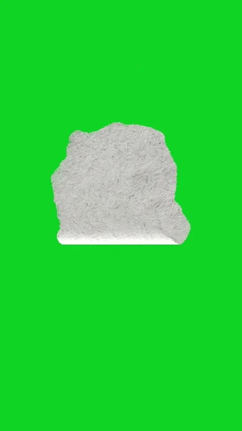 Vertical small grey crumpled paper piece float revealing animated on green 库存影片 335217010