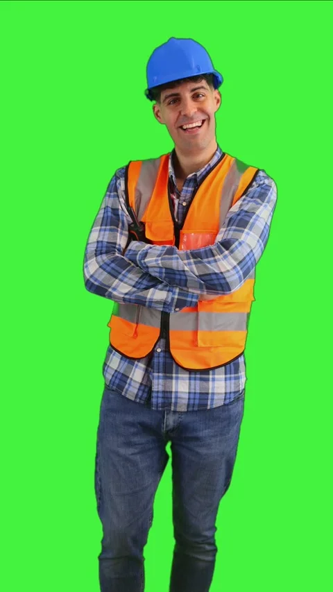Vertical Smiling construction engineer crossing arms while looking at the c.. Stock-Footage 287327994