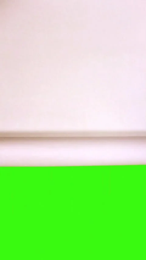Vertical Smooth Paper Roll Transition on Green Screen Stock Footage 324803103