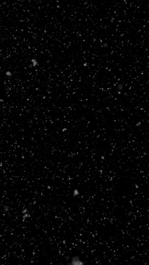 Vertical Snow Gently Blowing on a Black 4K Loop Stock Footage 273239655