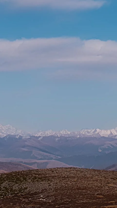 Vertical Snow Mountain Peak Clouds Flow Nature Motion Timelapse Stock Footage 327671525