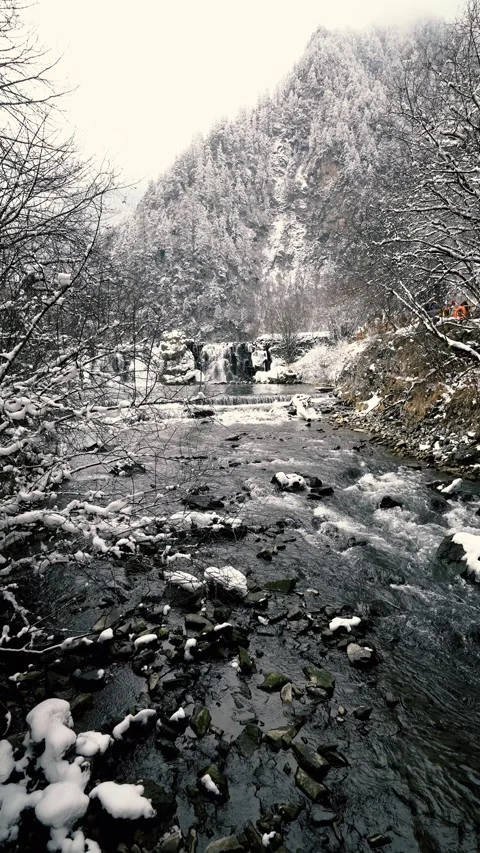 Vertical Snow Nature view and waterfall in winter in Bipenggou Stock Footage 310720355
