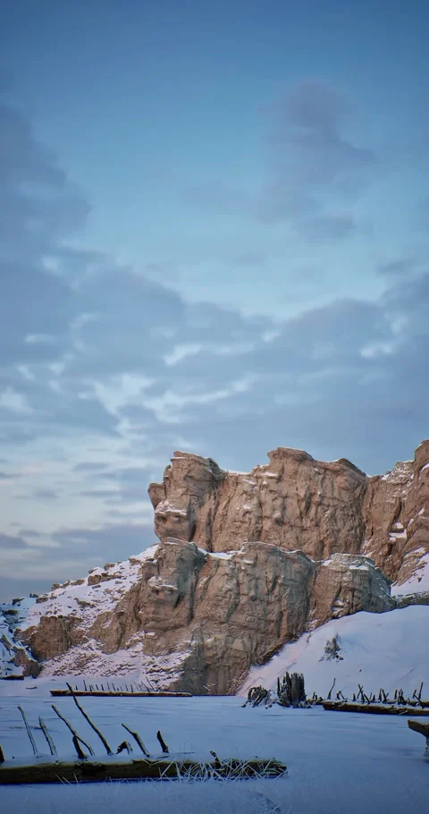 Vertical snowy mountain range with a clear blue sky Stock Footage 292850040