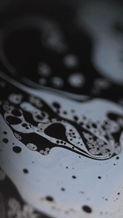 Vertical soap foam bubble water oil texture dark Video stock 311993452