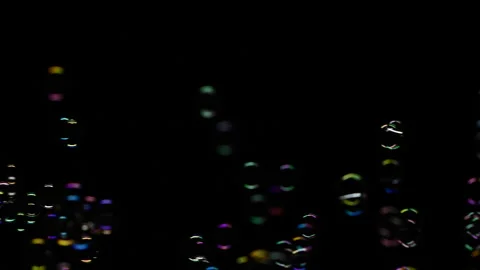 Vertical of soap water bubbles texture flying over black abstract background Stock Footage 256125340