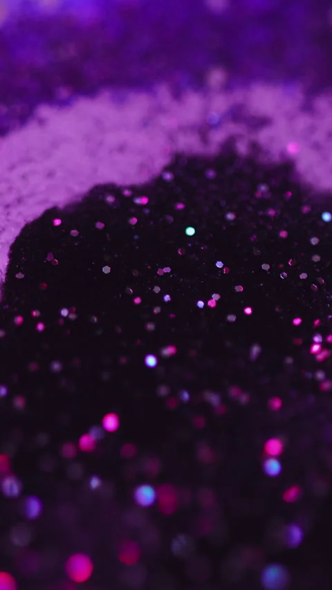 Vertical Sparkling fluid flow bokeh light purple gel ink Stock Footage 284195187