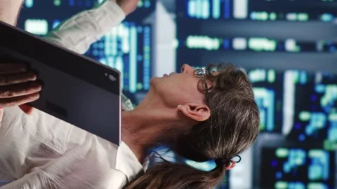 Vertical Specialists running code in data center Stock Footage 247930157