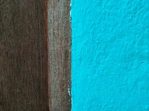 Vertical split composition featuring dark weathered wood planks on the left.. Stock Photos