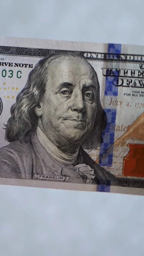 Vertical. A stack of crisp, dollar bills, held in capable hands. Stock Footage 304630710