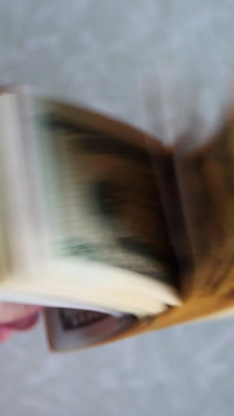 Vertical. A stack of crisp, dollar bills, held in capable hands. Stock Footage 304632535