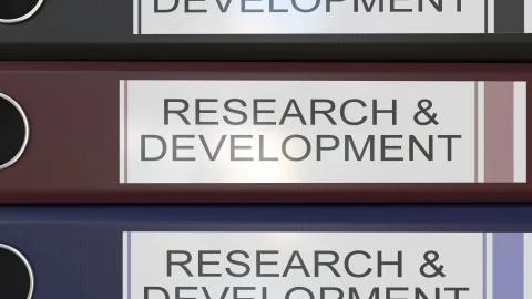 Vertical stack of multicolor office binders with Research and development tags 스톡 일러스트