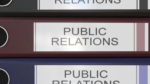 Vertical stack of multicolor office binders with Public relations tags 3D Stock Illustration