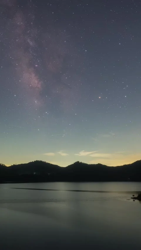 Vertical Starry Night Lake Timelapse with Milky Way Reflection and Calm Water Stock Footage 327478663