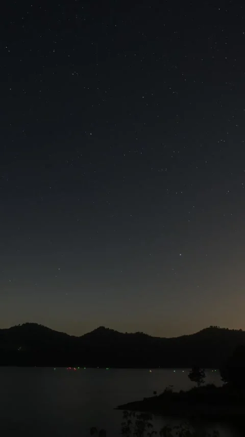 Vertical Starry Night Lake Timelapse with Milky Way Reflection and Calm Water Stock Footage 327478833