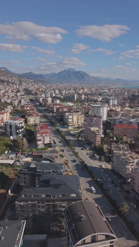 Vertical Static Aerial Hover Over Alanya Street with Moving Cars, Turkey Stock Footage 327459307