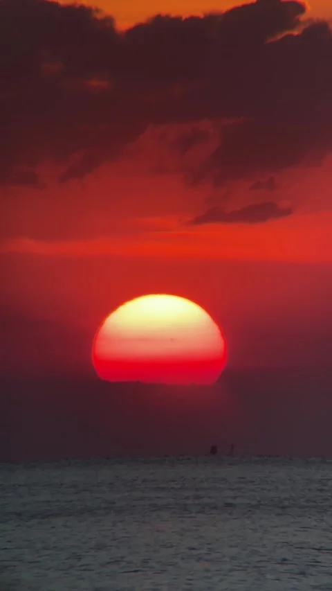Vertical Static Shot of Giant Red Sunset Sinking in Ocean Horizon Bali Stock Footage 340411449
