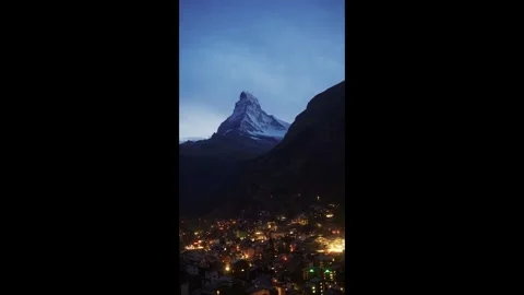 Vertical static shot of Matterhorn and Zermatt at blue hour, Switzerland Video stock 320798042