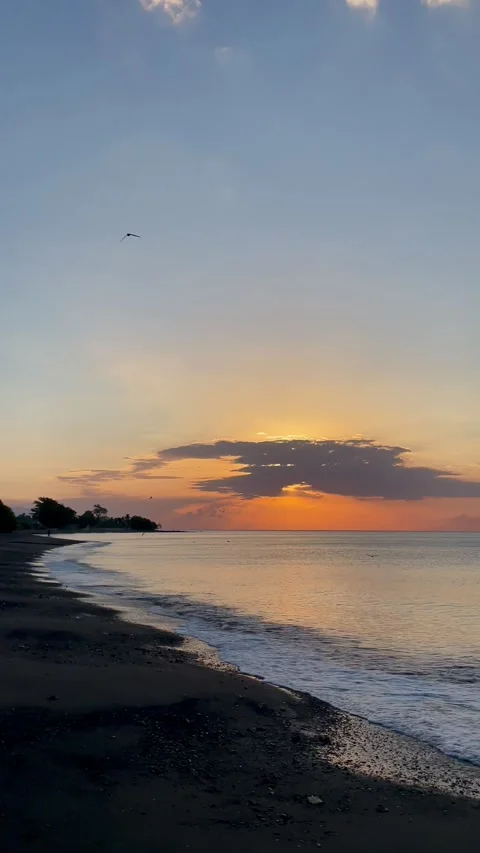Vertical Static Shot of Sunset Beach with God Rays in Bali Stock Footage 340411424