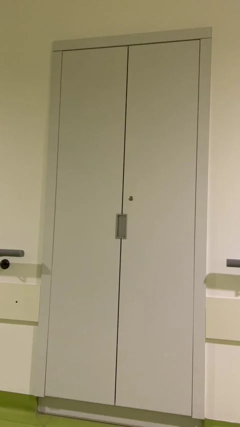 Vertical stock video closed storage cabinet and corridor rail Vidéo 347325926