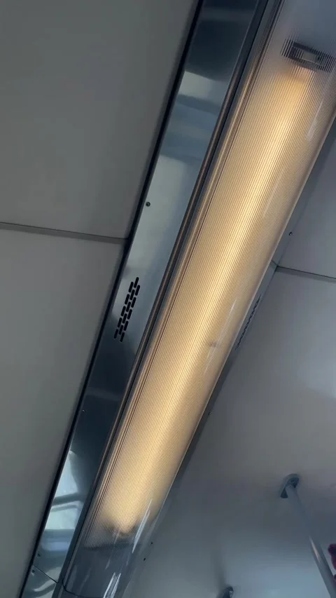 Vertical stock video train ceiling light overhead fixture study 動画素材 347332496