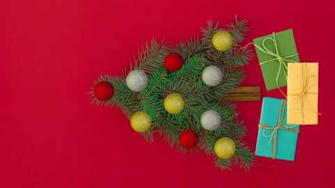 Vertical stop motion animation of Christmas tree with decorations Stock Footage 142450175
