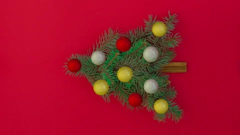 Vertical stop motion animation of Christmas tree with decorations Stock Footage 142533862