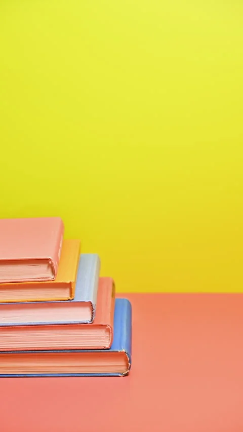 Vertical Stop Motion of Books Arranging in Delight Video stock 258598800