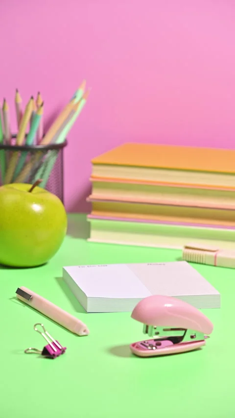 Vertical Stop Motion of School Table with Supplies and Stationery Appearing Stock-Footage 258668169