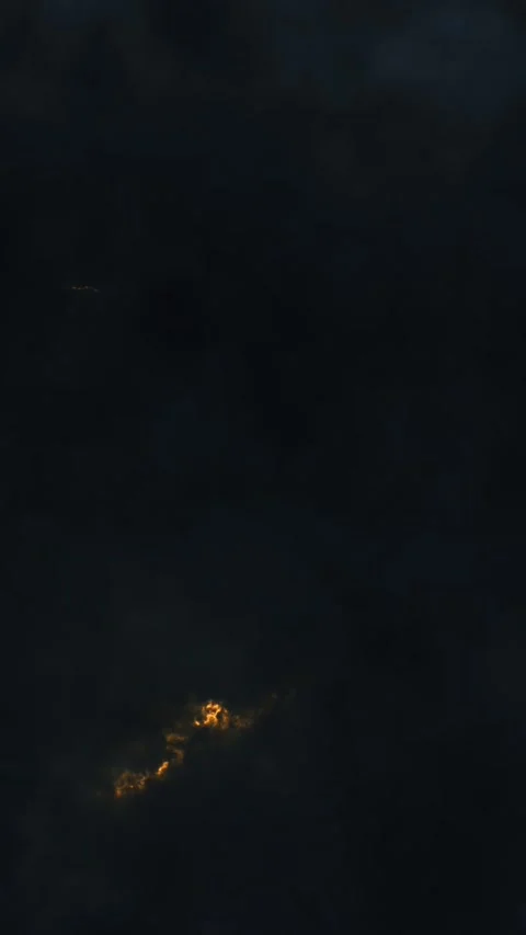 Vertical Storm Clouds with Blue and Orange Lightning 4K Loop Stock Footage 273239585