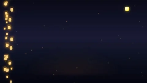 A vertical string of glowing golden paper lanterns against a dark night sky 库存影片 335149840