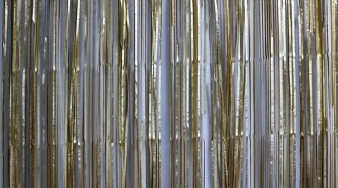 Vertical stripes in sparkling material as a backdrop Stock Photos