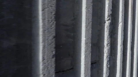 Vertical strips of concrete structures in the form of wall background texture Stock Footage 124762249